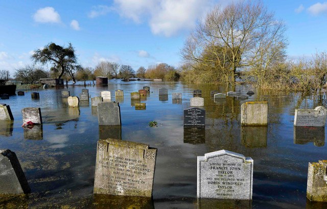 A graveyard is seen underwater in the village of Moorland in south west England